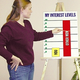 Duquette makes a point to her boyfriend using a chart made at Copy Express.